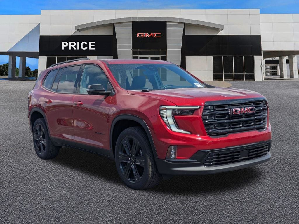 2026 GMC Acadia Elevation in Volcanic Red Tintcoat — front three-quarter view