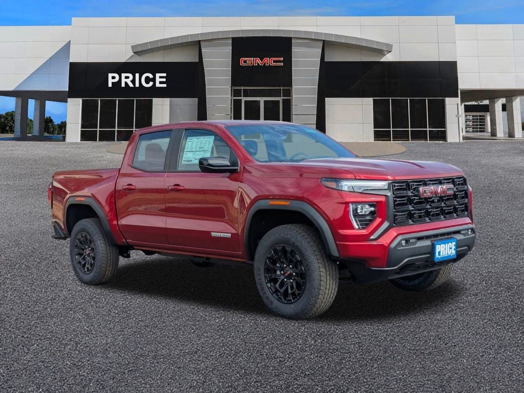 2026 GMC Canyon Elevation in Volcanic Red Tintcoat — front three-quarter view